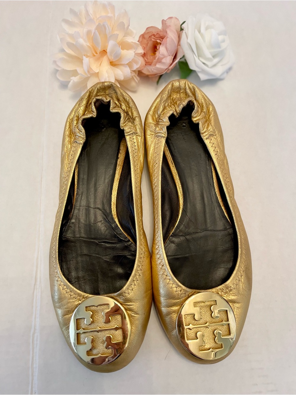 Tory Burch Minnie Travel Ballet Flats in a metallic gold